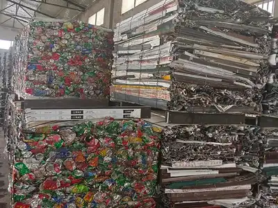 Mixed aluminium profile scrap compressed into transport bales