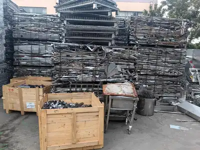 Processed aluminium profile scrap stacked after baling