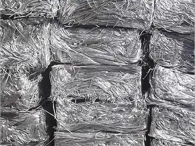 Finished dense aluminium wire bales stacked together