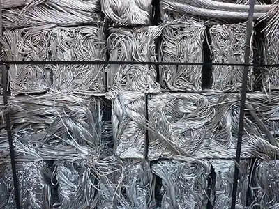 Strapped aluminium wire bales prepared for transport