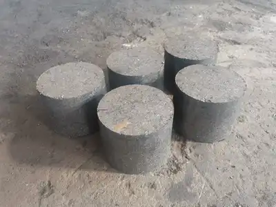 Four cylindrical cast iron chip briquettes