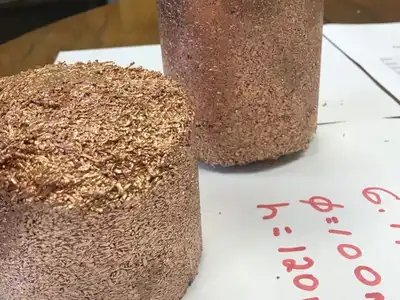 Copper granule briquettes prepared for size and density measurement