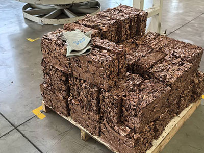 Stacked copper turnings transport bales