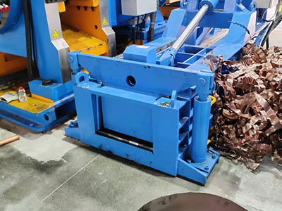 Hydraulic baling of copper turnings