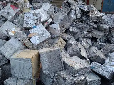 Compressed thin sheet metal bales ready for handling