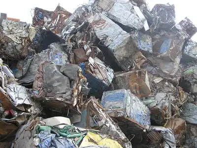 Stacked bales of mixed thin-gauge steel scrap