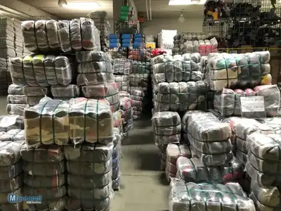Warehouse of graded and strapped clothes bales