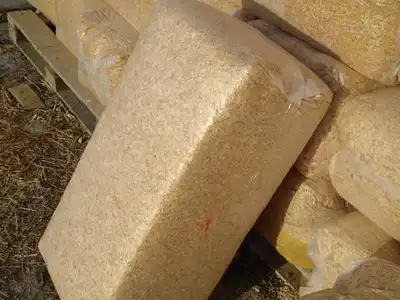 Stock of compressed rice husks bales