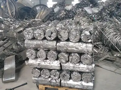 Uniform stainless steel scrap bales prepared for handling