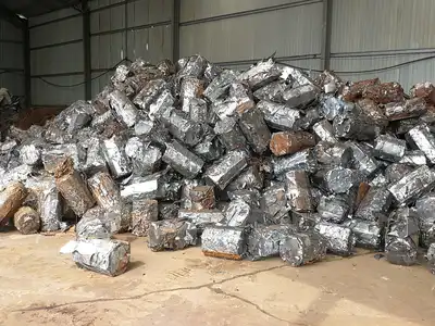 Compressed stainless steel scrap bales stored in a warehouse
