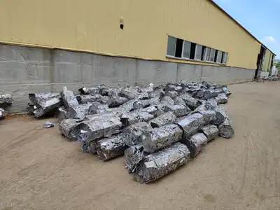Stainless steel scrap bales arranged in an outdoor yard
