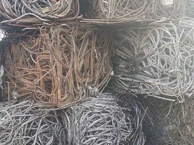 Dense bundled steel bar bales ready for shipment