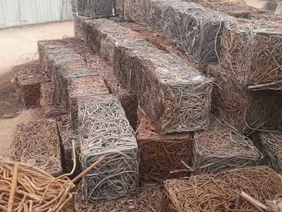 Stacked rectangular bales made from tangled rebar