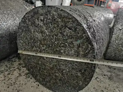 Cross-section of a high-density steel swarf briquette