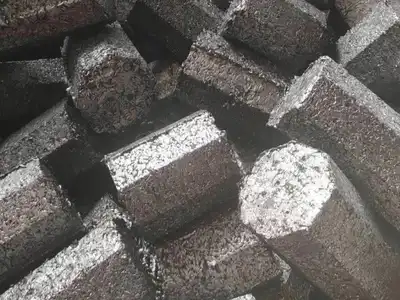 Close view of dense steel shaving briquettes