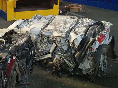 Freshly compressed automobile shell bale