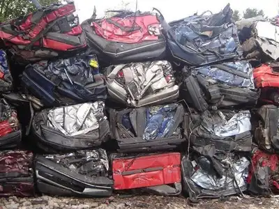Stacked colored car body bales after compression
