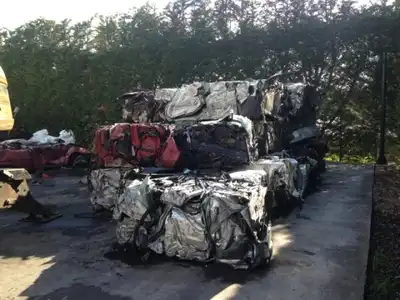 Stacked rectangular waste vehicle bales
