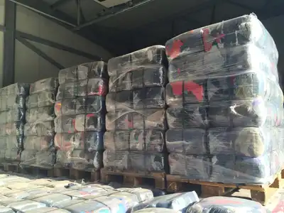 Wrapped wiping-rag bales prepared for shipment