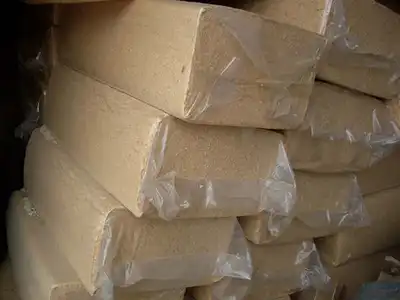 Clear-bagged sawdust blocks in storage