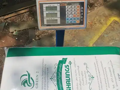 Bagged wood-shavings bale checked on a scale