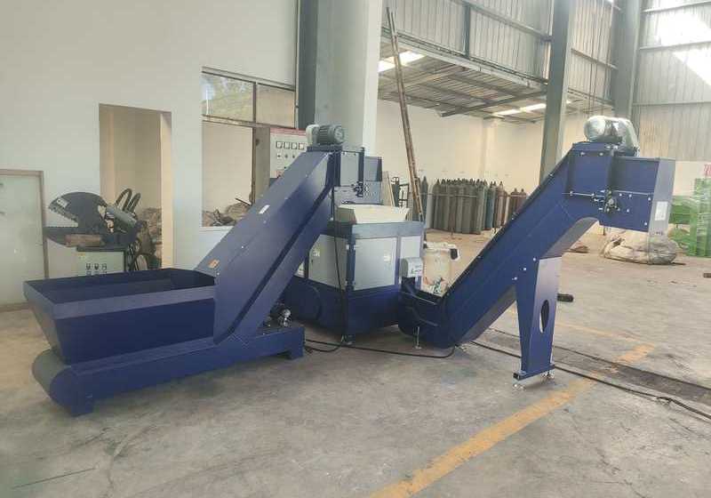 DILOYA metal-chip processing equipment connected by inclined conveyors