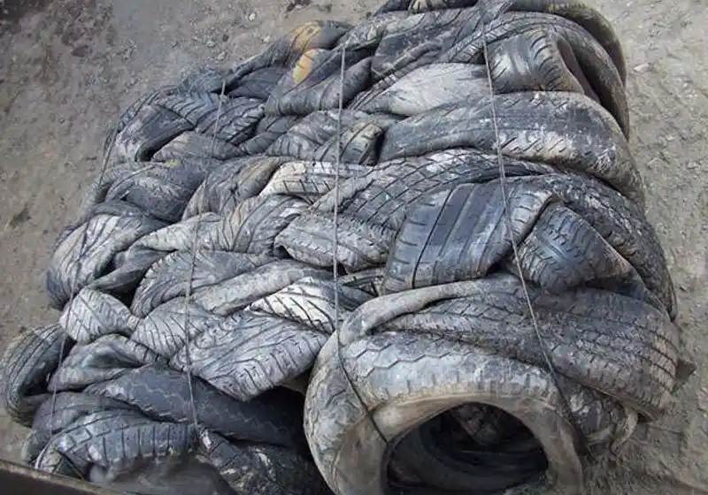 Top view of compressed tires within a retained bale